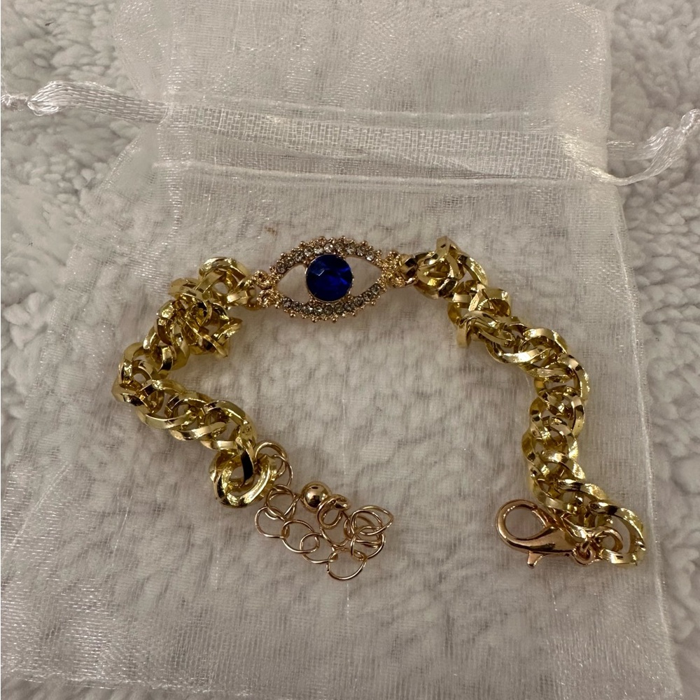 NWOT Gold Tone Evil Eye Bracelet with Blue Accent